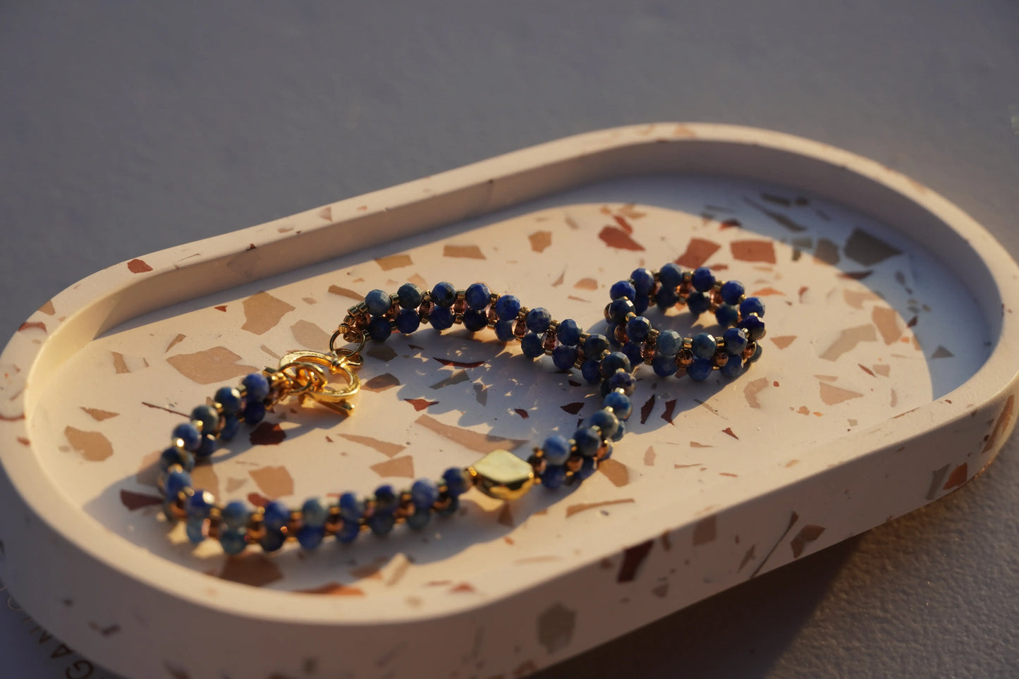 Lapis lazuli bracelet side angle showing clasp and beads