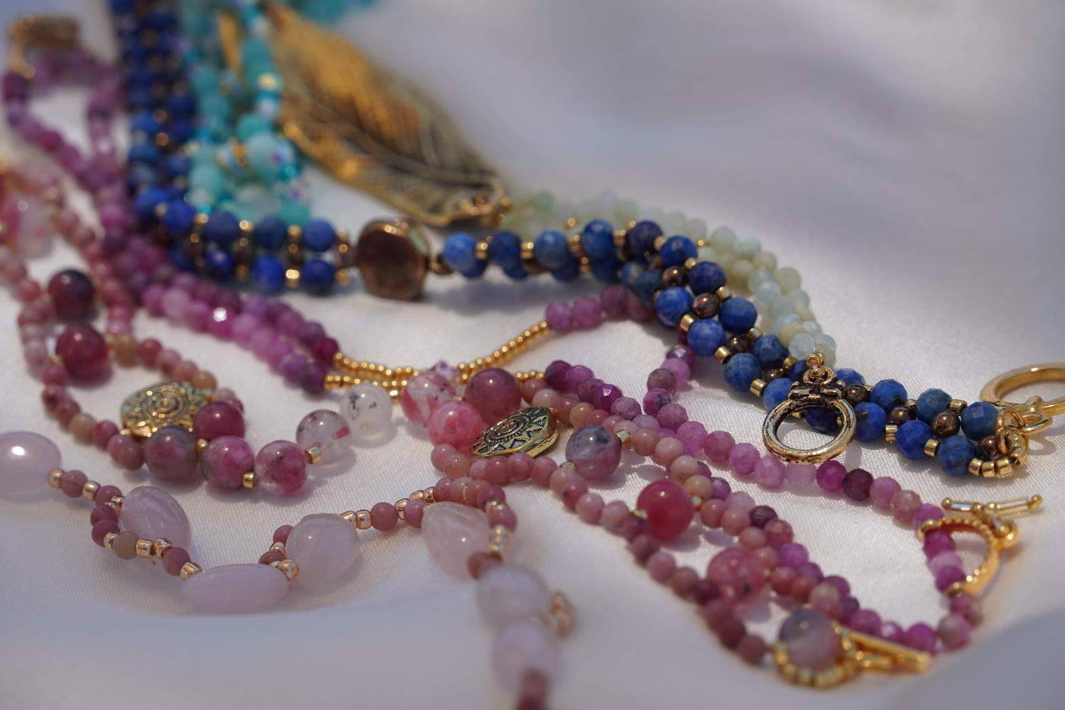 Hands with different bracelets on them