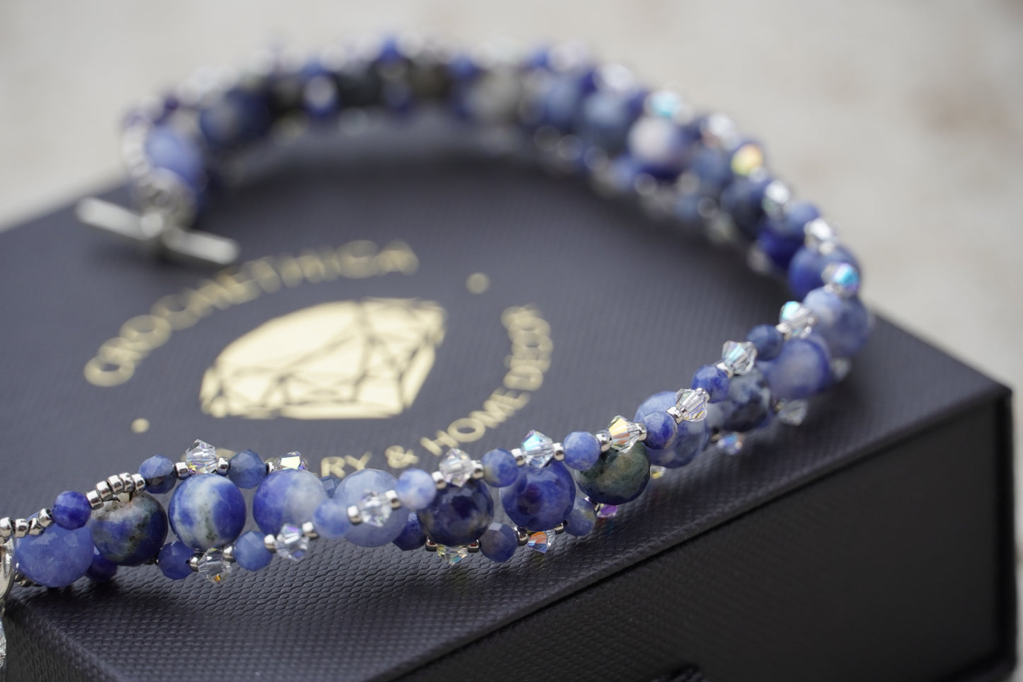 Close-up of sodalite beads with palladium-plated Japanese and Czech bicone accent beads