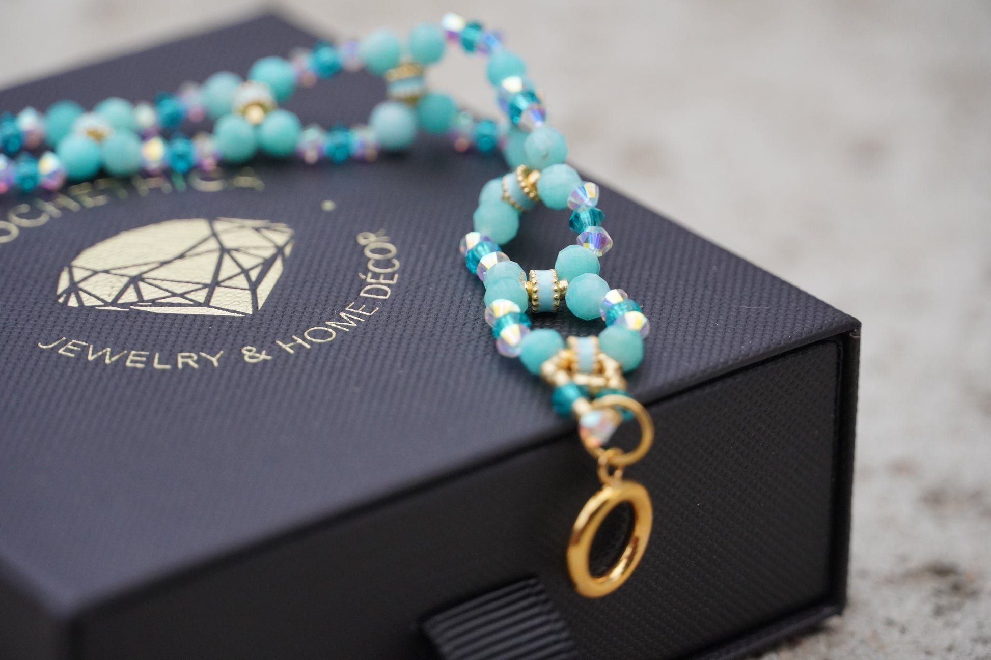 Close-up of Peruvian amazonite beads with Austrian bicone and Japanese galvanized accent beads