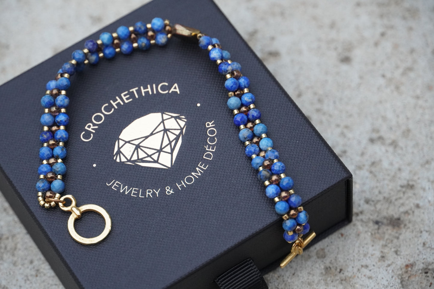 Close-up of lapis lazuli beads with natural golden flecks