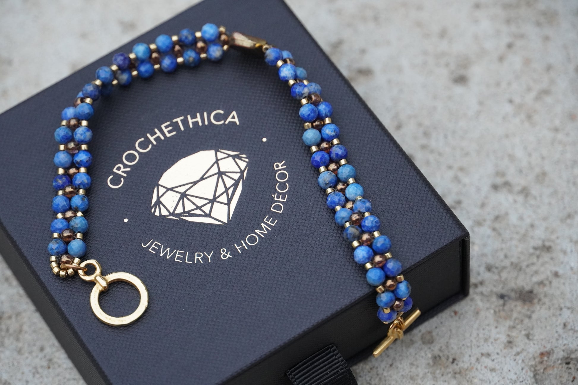 Close-up of lapis lazuli beads with natural golden flecks