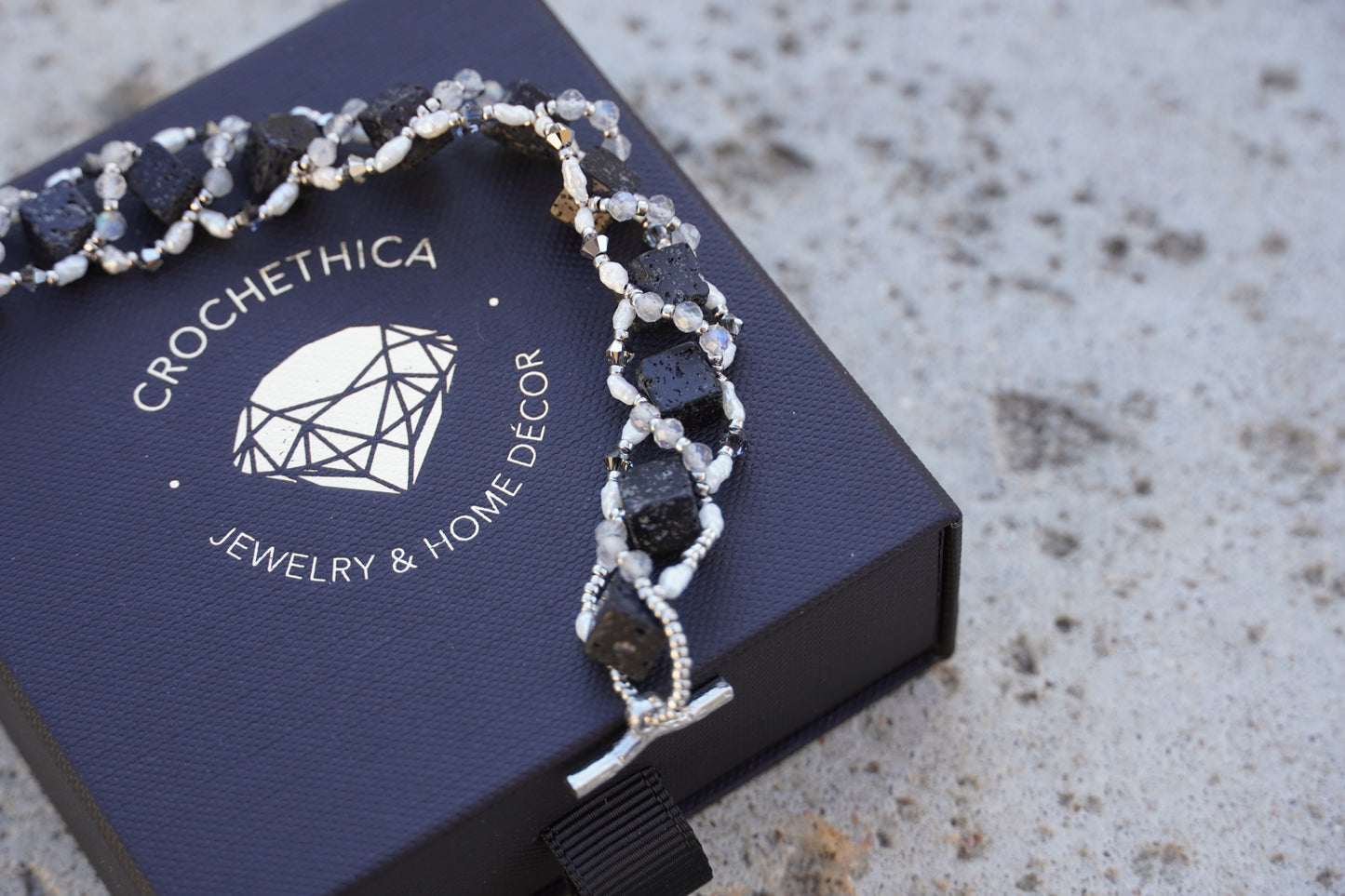 Close-up of labradorite and pearl beads with palladium-plated accent beads